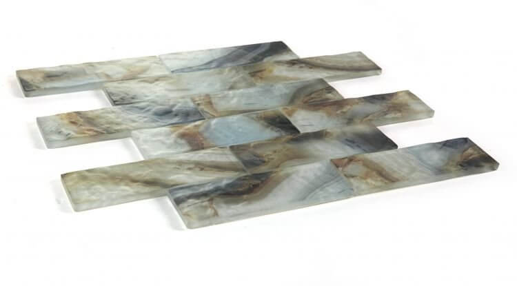 Art Onyx Mauna 11.75x11.75 linear brick pattern glass tile in blue, brown, and beige colors.