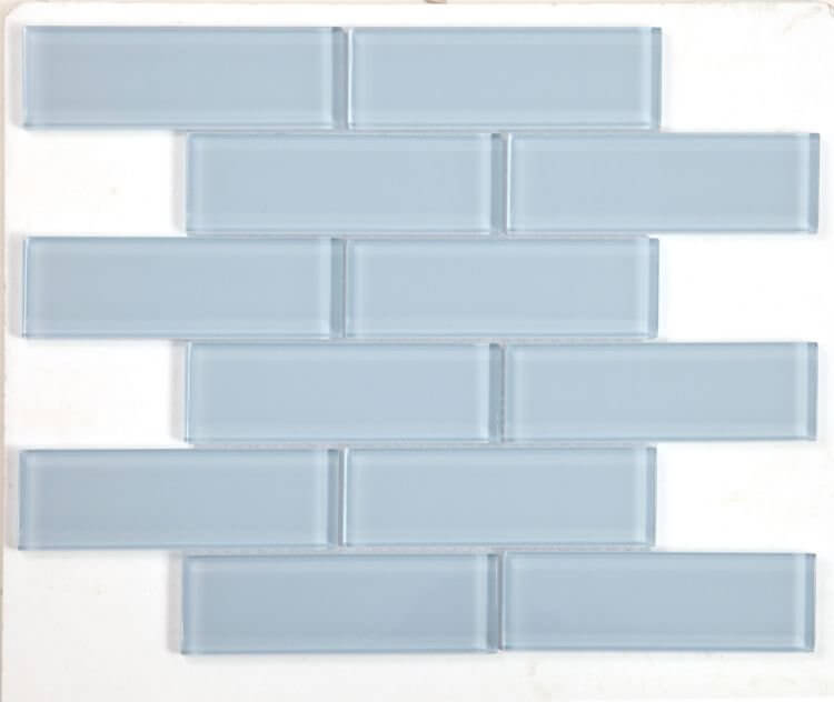 Casale Lucy Blue polished hand-painted glass tiles in a subway layout, 11.75 x 11.75, ideal for swimming pool installation.
