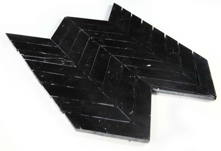 Chevron Marquina marble mosaic in polished black finish, showcasing beautiful herringbone pattern design.