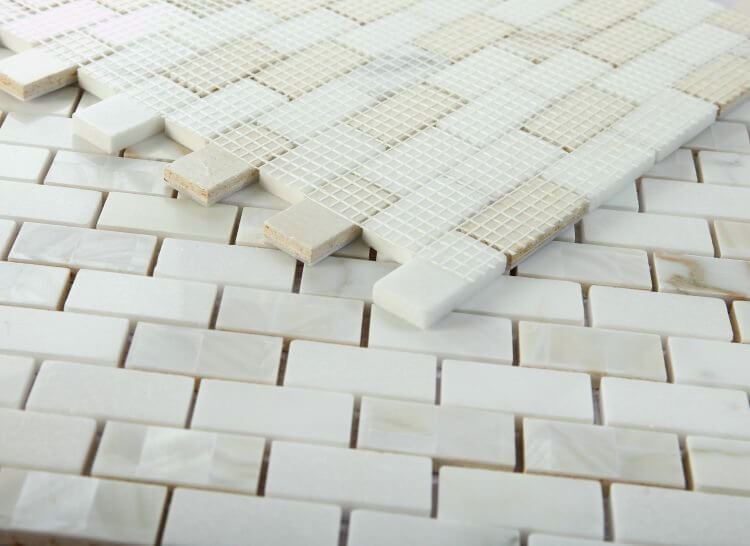 Diana Brick Calacatta 11.75 x 11.75 mosaic tile featuring white and gold marble, ideal for elegant interior designs.