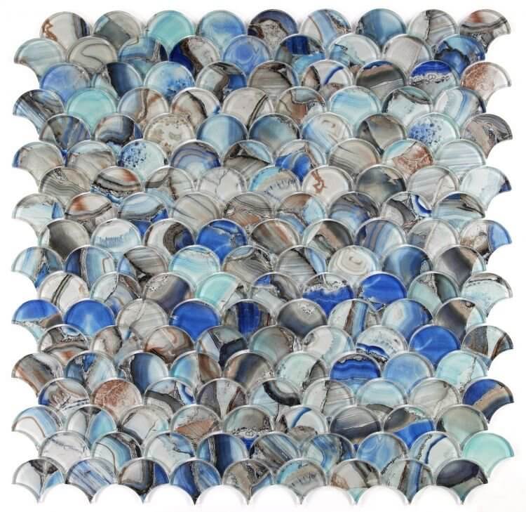 Dragon Scale Shell Blue glass mosaics featuring a wave pattern in various blue shades, measuring 9.5 x 9.75 inches.
