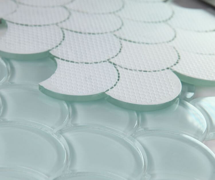 Dragon Scale Turquoise 9.5 x 9.5 glass mosaic with a glossy blue-green finish, perfect for swimming pools.