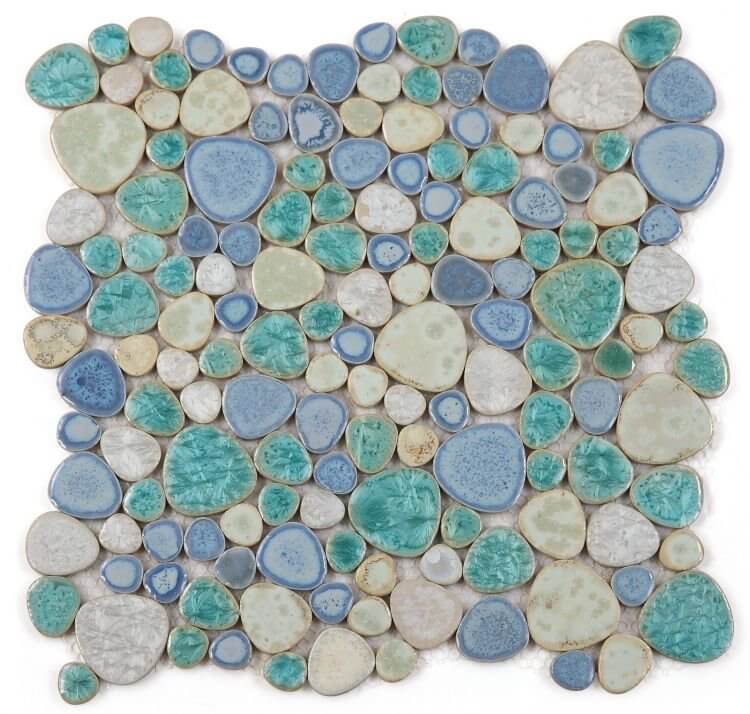 Poseidon Sea Pebble 11.5x11.5 mosaic tile featuring smooth, organically shaped pebbles in shades of blue and green.