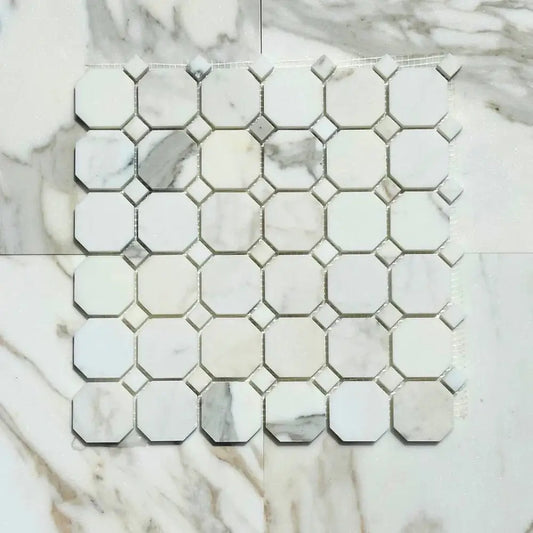 12x12 Calacatta Gold octagon mosaic tile showcasing elegant white and gold veining on a marble surface.