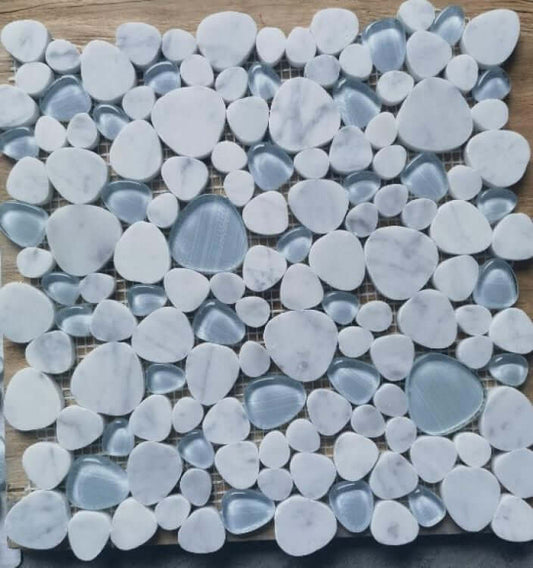 Carrara Blue Pebble Mosaic 12x12 tile featuring white marble and blue glass pieces in playful heart shapes.