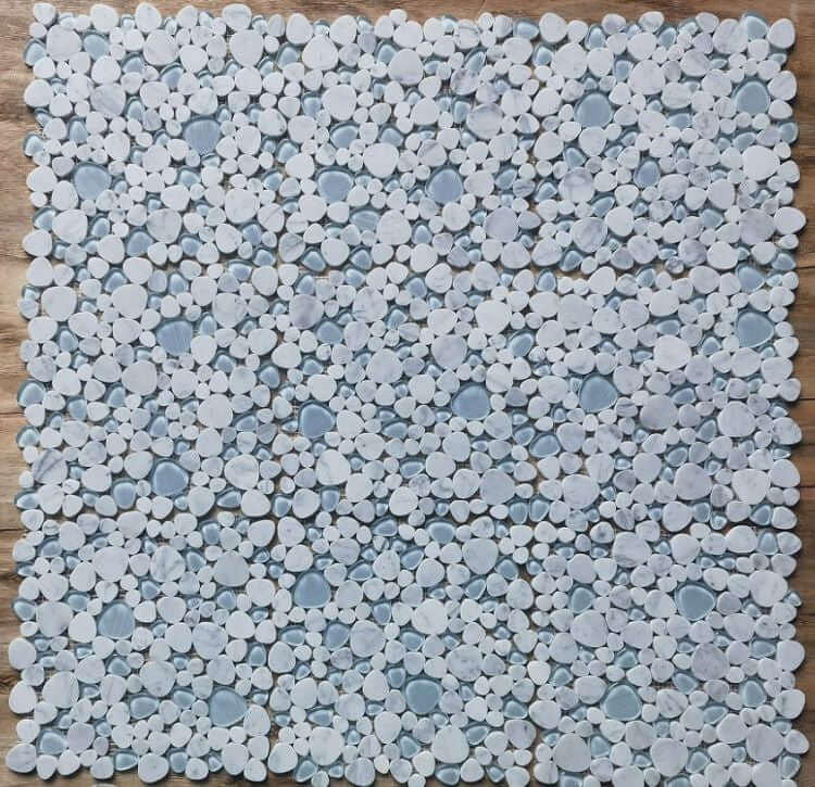 Carrara Blue Pebble Mosaic Tile featuring hand-painted heart-shaped blue glass accents.