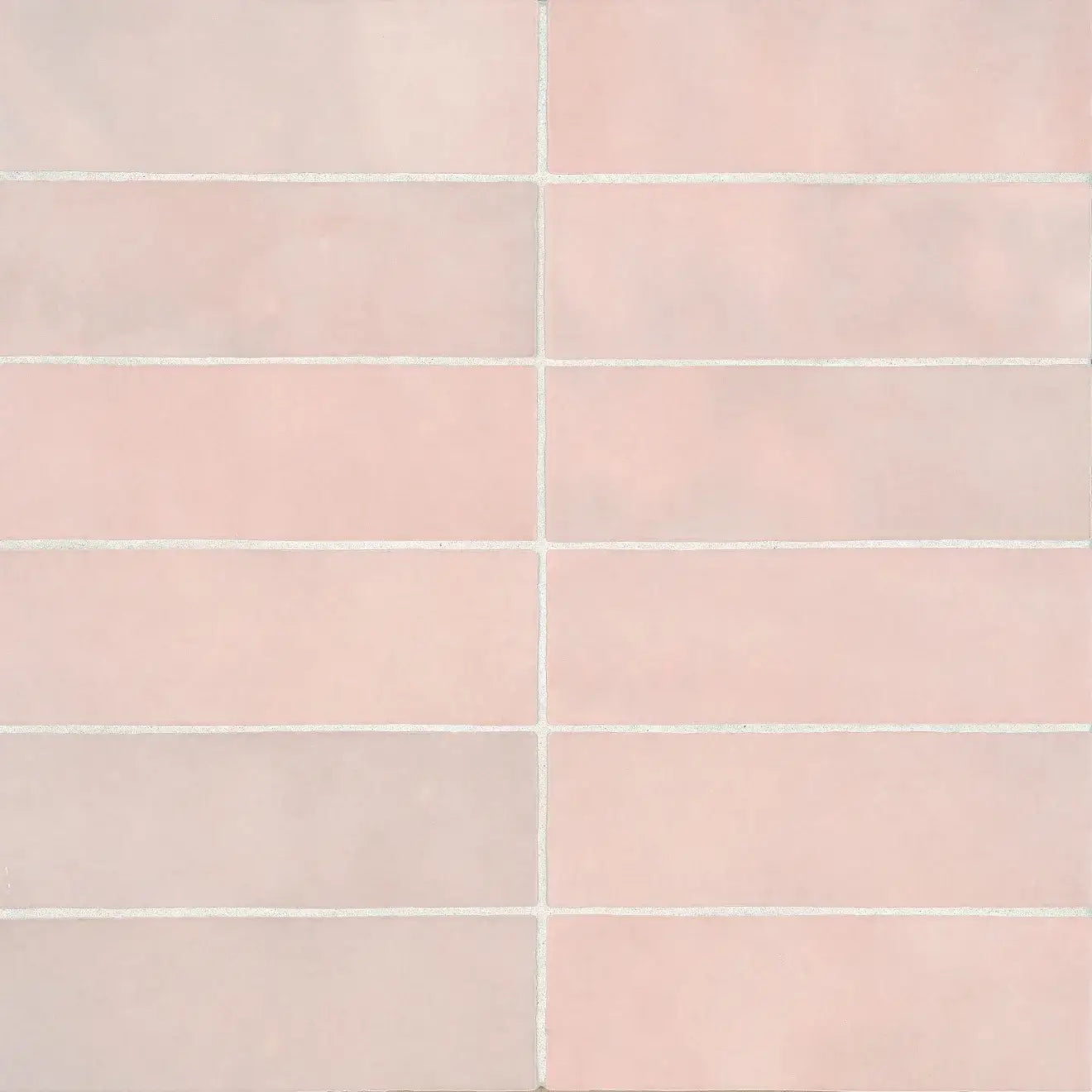 Cloé 2.5" x 8" glossy pink ceramic tile displayed in a rectangular pattern, perfect for stylish home design.