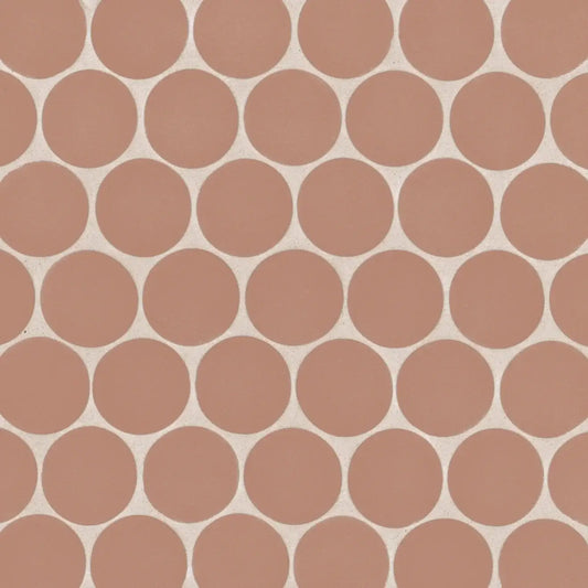 Makoto 2" round matte porcelain mosaic tile in Umi Terracotta, showcasing a circular pattern in earthy terracotta tones.