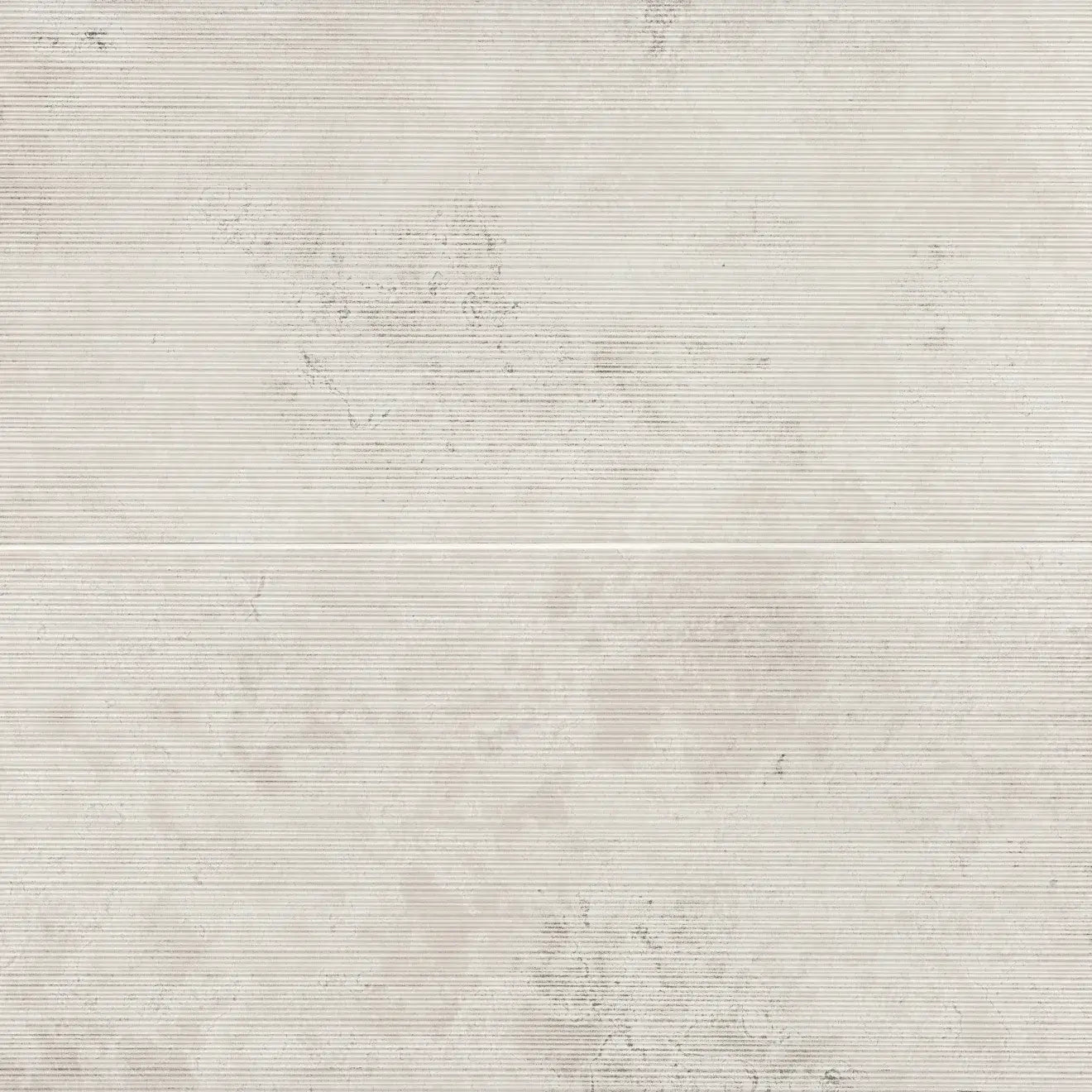 Italian Thaddeus 24" x 48" matte porcelain decorative tile in white with subtle pattern.