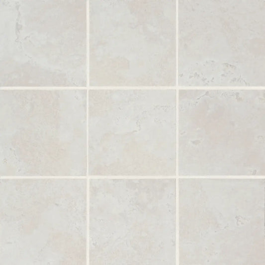 Thaddeus 4" x 4" matte porcelain mosaic tile in white, featuring a subtle, elegant design.
