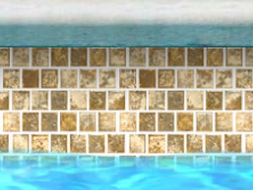 Fujiwa Tile Joya Series 1x1 Gold Pool Rated Tiles displayed in a sparkling pool setting.