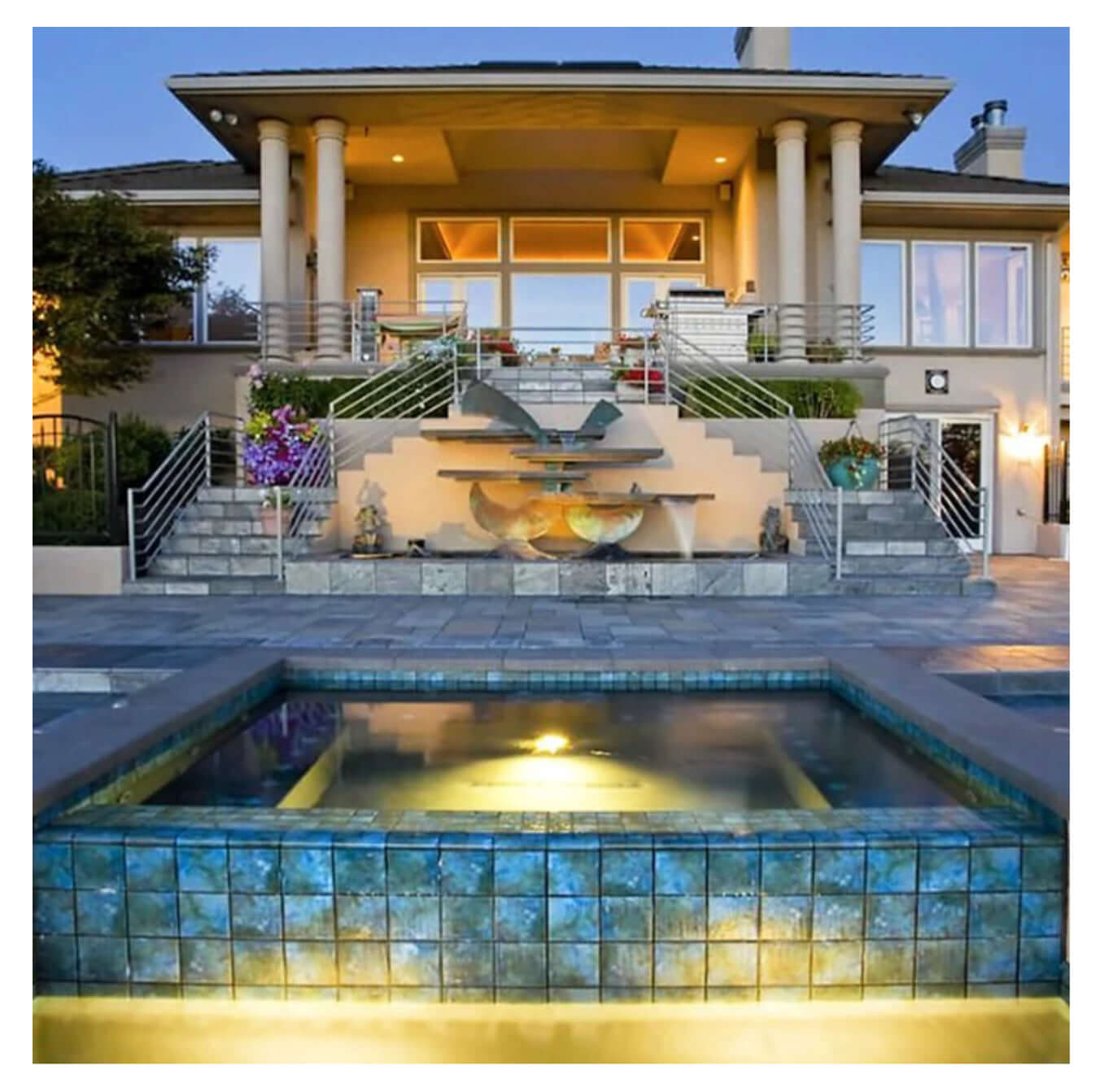 Elegant pool area featuring Fujiwa Joya Albi 6x6 semi gloss porcelain tiles with a stunning blue design.