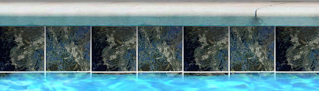 Close-up of Fujiwa Java Series Montana 6x6 porcelain pool tile along the waterline, enhancing pool aesthetics.