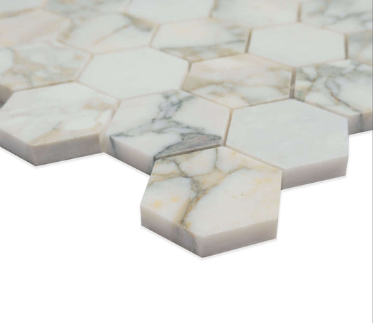 Close-up of 2" Calacatta Green Marble Hexagon Honed Mosaic Tile showcasing intricate patterns and deep green hues.