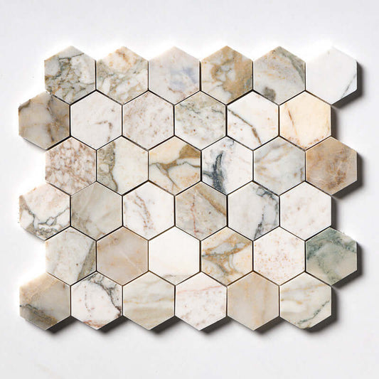 Hexagon marble mosaic tile showcasing cream and beige hues, ideal for elegant interior design projects.