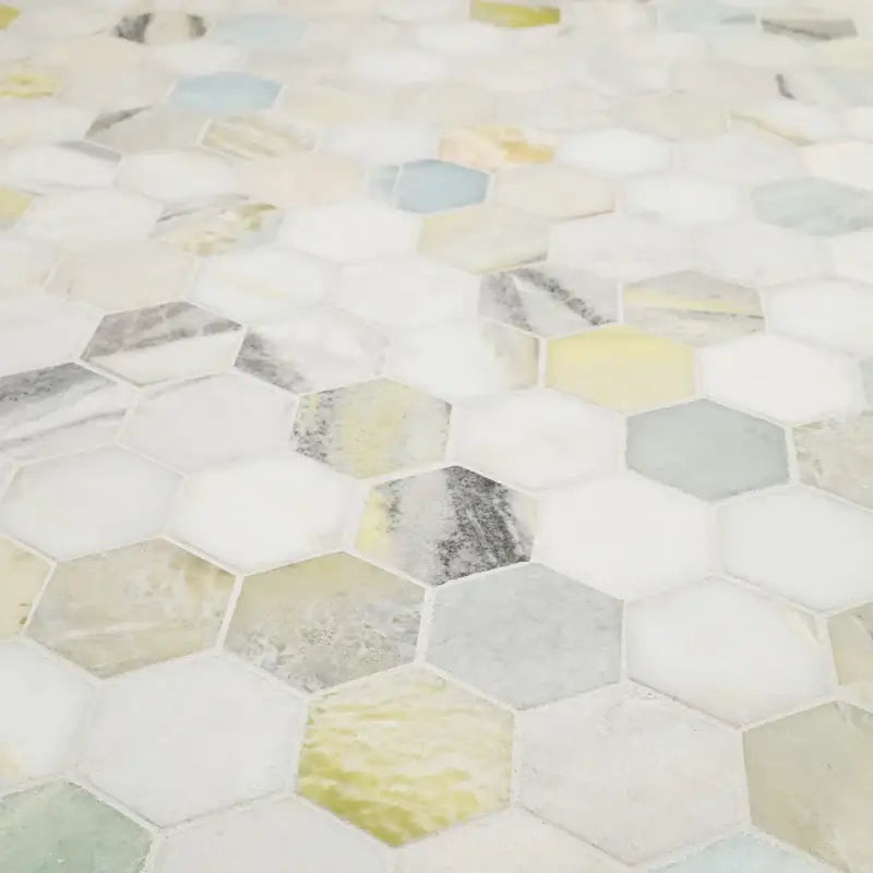 Cloudland 2" hexagon polished marble mosaic tile, showcasing intricate veining and a sophisticated design for flooring and walls.