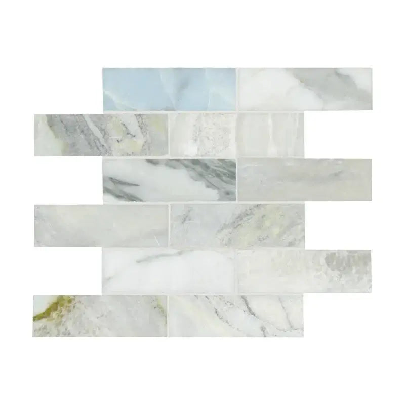 Cloudland 2x6 Polished Marble Subway Mosaic Tile featuring a blend of white, gray, and blue veining patterns.