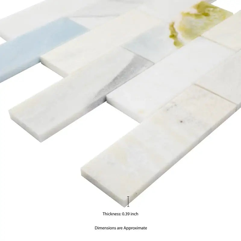 Close-up of Cloudland 2x6 polished marble subway mosaic tile, showcasing thickness and elegant veining.