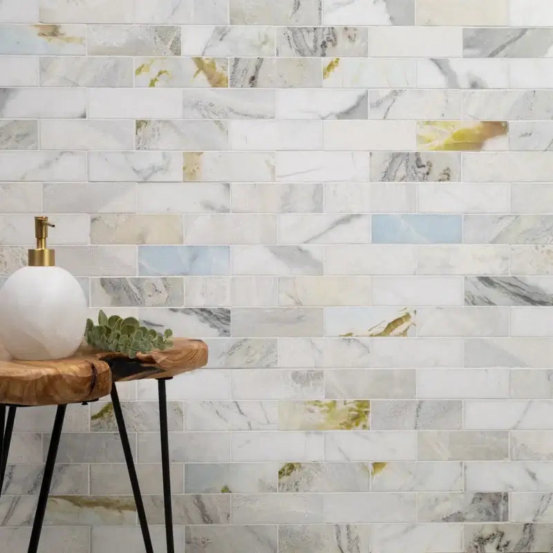 Cloudland 2x6 polished marble subway mosaic tile wall featuring elegant shades of white, gray, and blue veins.