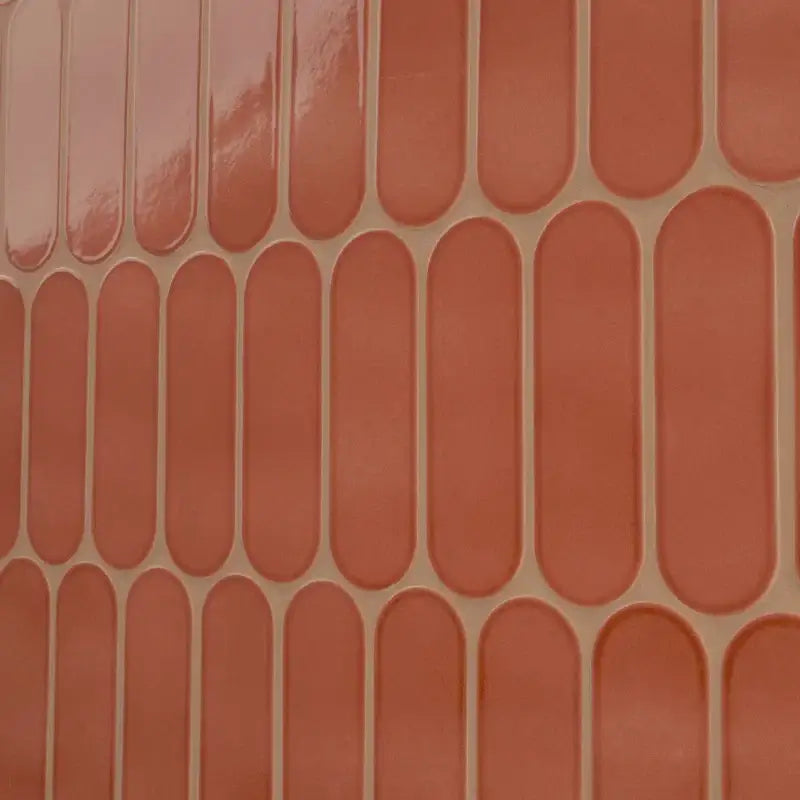 Terra Ellipse 12" X 12" glossy glass mosaic wall tile featuring modern ellipse design in warm earthy tones.