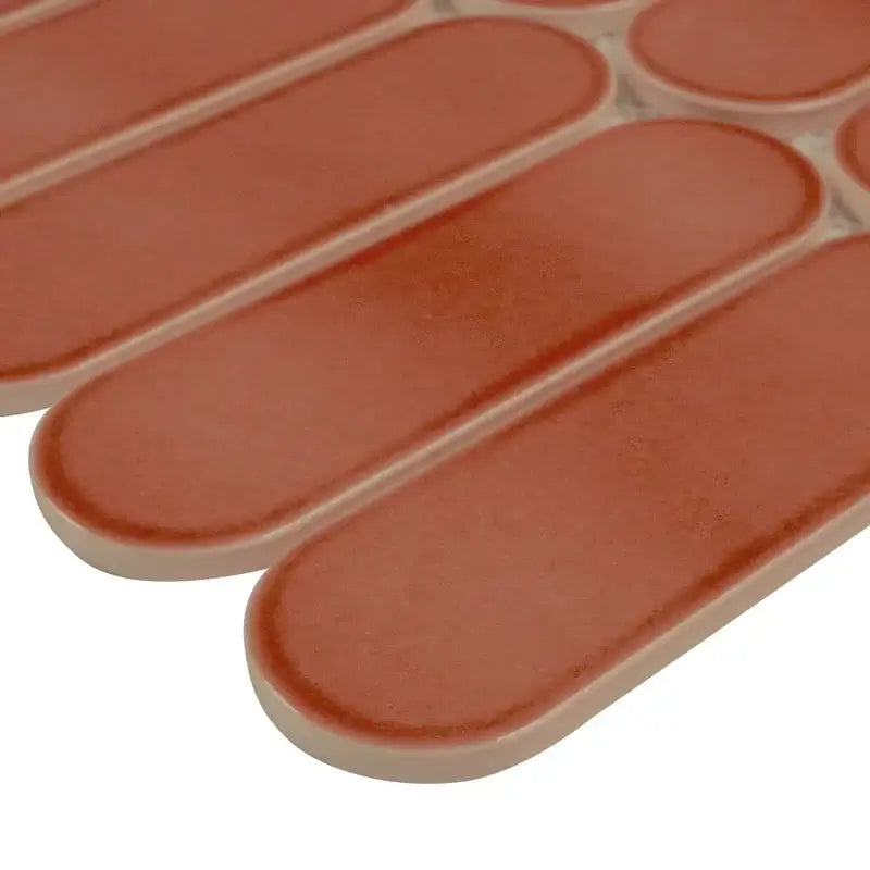 Terra Ellipse 12x12 glossy glass mosaic wall tile in vibrant earthy tones with a modern ellipse design.