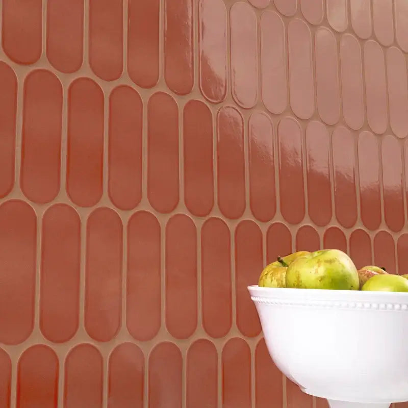 Terra Ellipse 12" X 12" glossy glass mosaic wall tile in vibrant earthy tones with oval design.