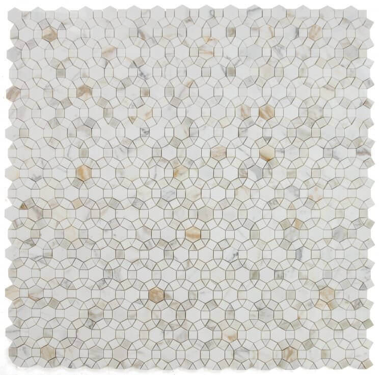 Aether Calacatta honed mosaic tile in hexagons, squares, and triangles, showcasing elegant patterns and textures.