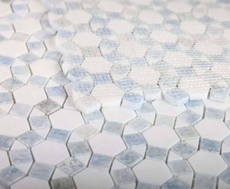 Aether Crystal Ocean mosaic featuring Thassos Marble and Azul Caribe Quartzite in hexagonal and circular patterns.