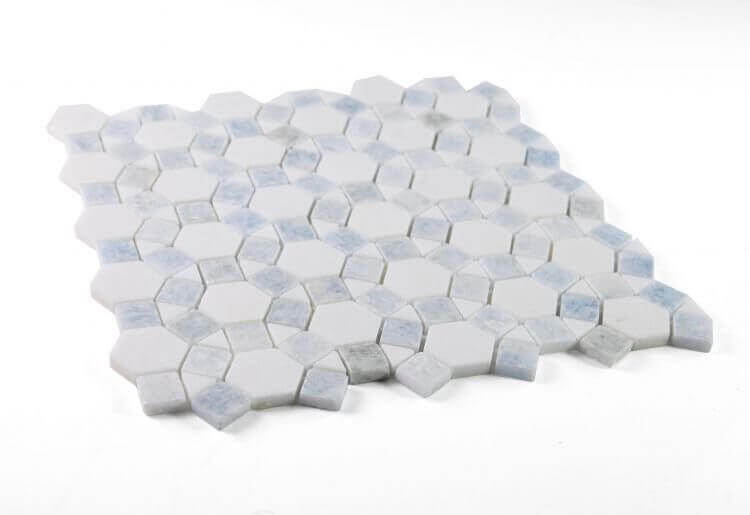 Aether Crystal Ocean mosaic with hexagonal Thassos Marble and Azul Caribe Quartzite tiles arranged in a stunning pattern.