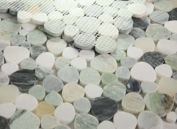 Aphrodite Grassland mosaics featuring assorted white and green stones, showcasing natural beauty and craftsmanship.