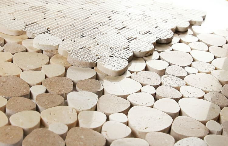 Aphrodite Mix Brown 12x12 mosaics featuring heart-shaped pieces in warm brown and beige tones.