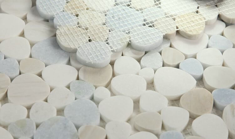 Aphrodite Sky Marble Mosaic featuring heart-shaped marble pieces in soothing blue, white, and beige tones.