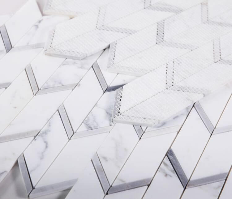Calacatta Blue Chevron marble tile featuring modern arrow pattern in elegant white and grey hues.