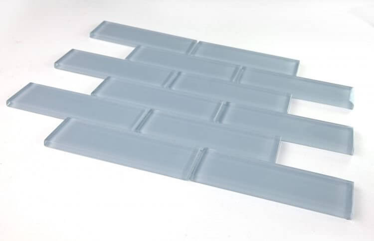Casale Lucy Blue 11.75 x 11.75 polished light blue glass tiles in subway layout for swimming pools.