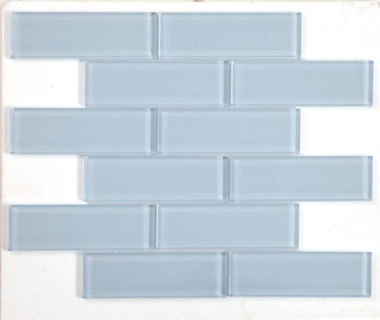 Casale Lucy Blue polished hand-painted glass tiles in a subway layout, 11.75 x 11.75, ideal for swimming pool installation.