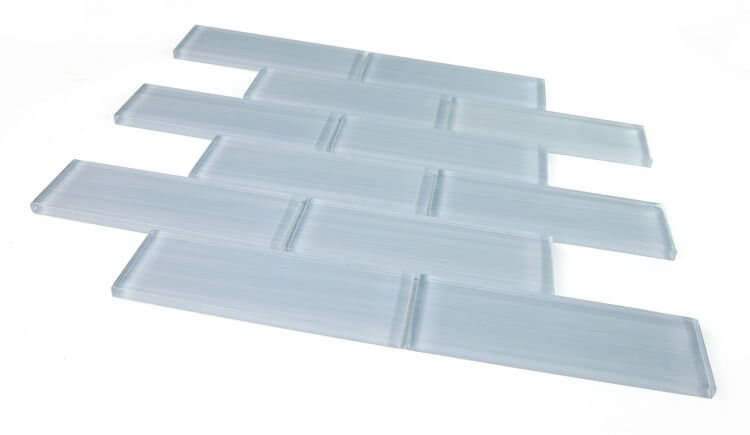 Casale Lucy Blue hand-painted glass tiles in subway layout, 11.75 x 11.75 for pool installation.