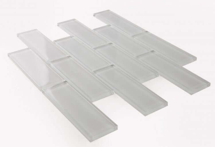 Polished white glass tiles in subway layout, ideal for swimming pool installation, 11.75 x 11.75 size.