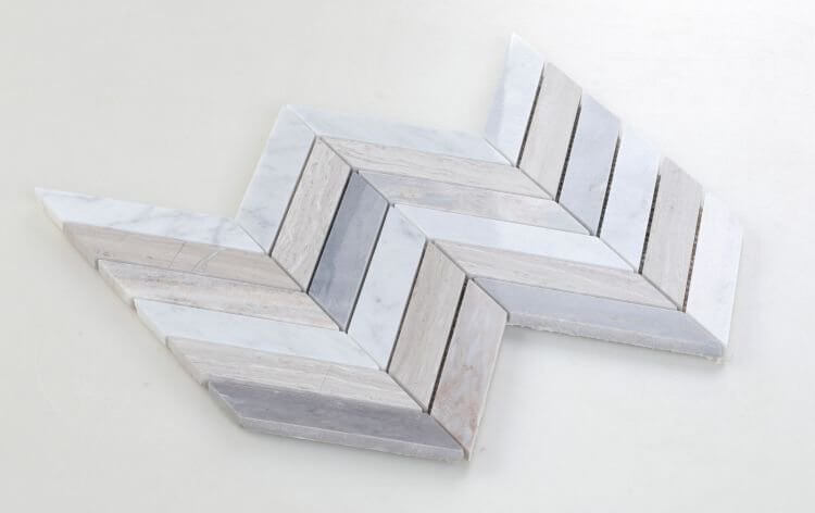 Chevron Blue marble mosaic tile featuring Carrara, Haisa Grey, and Blue Palissandro in a stylish pattern.