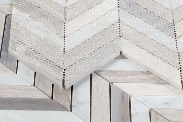 Carrara Blue Chevron 8x12 marble mosaic tile showcasing a sophisticated chevron pattern in elegant hues.