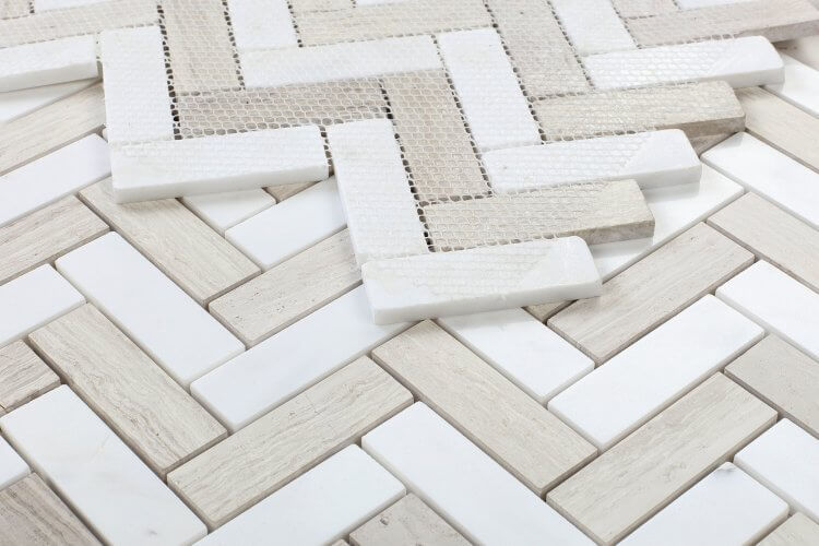 Chevron Bianco Dolomite Marble Mosaic Tile featuring elegant white and beige patterns, ideal for luxury walls and backsplashes.