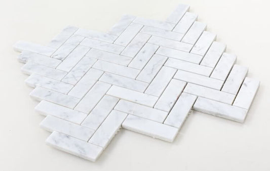 Chevron Long Carrara marble mosaic tile showcasing an elegant white polished finish.