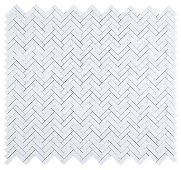 1x3 Chevron Long Thassos marble mosaic tile in luminous white, showcasing a modern herringbone pattern.