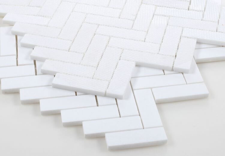 1x3 Chevron Long Thassos marble mosaic tile in a modern white herringbone pattern, perfect for elegant designs.
