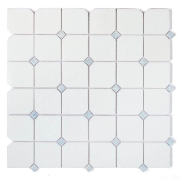 Thassos Blue Diamond 11.75x11.75 mosaic tile featuring geometric clipped pattern of white marble with blue accents.
