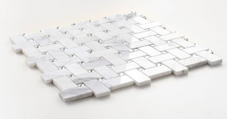 White Volakas marble 1x2" tiles with clear diamond glass in basket weave pattern for elegant decor.