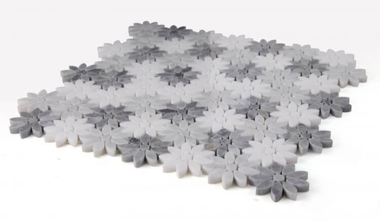 Daisy Wild Grey mosaic featuring a floral pattern in white and grey marble, perfect for sophisticated decor.