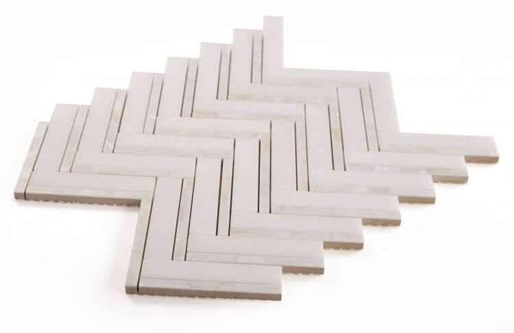Diana Herringbone Thassos mosaic tile featuring white Thassos Marble and Mother of Pearl in a herringbone pattern.