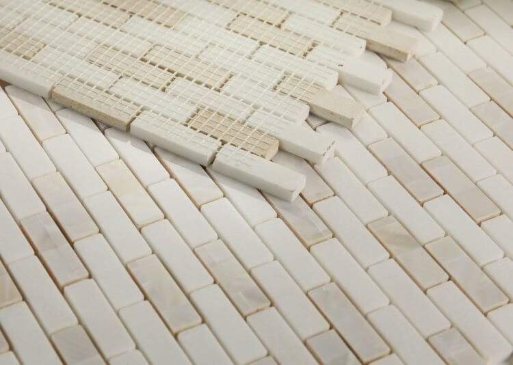 Diana Linear Thassos 11.75 x 12 white marble mosaic tile, showcasing a linear stacked pattern for modern decor.