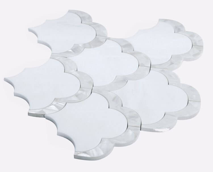 Diana Scale 10.5 x 12 white marble and Mother-of-Pearl mosaic tile with artistic scale-like pattern.
