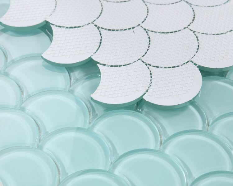 Dragon Scale Mint glass mosaic tiles in mint green, showcasing a dragon scale pattern for pool installations.